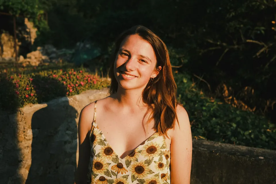 Smiling woman in a garden