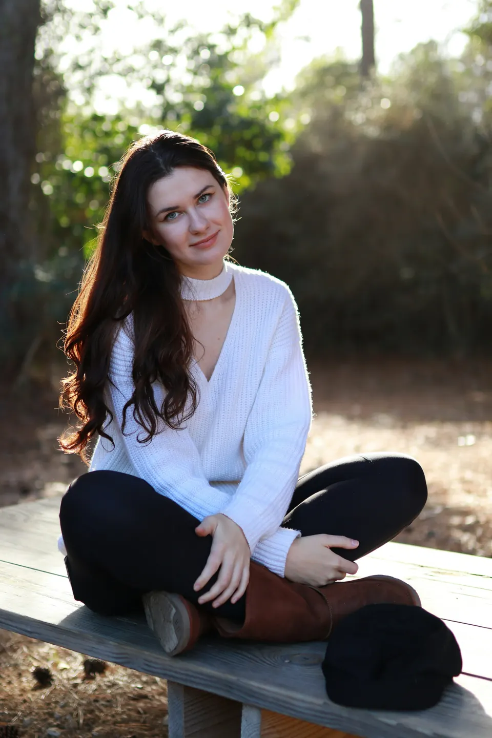 Woman sitting on a bench outdoors