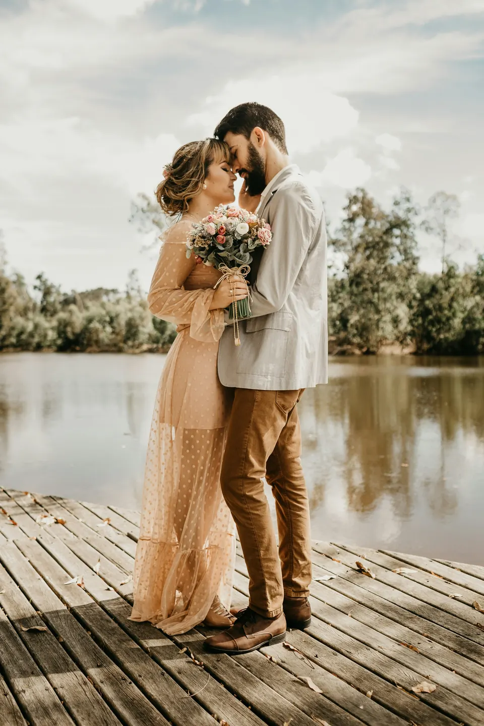 Couple on a lake dock