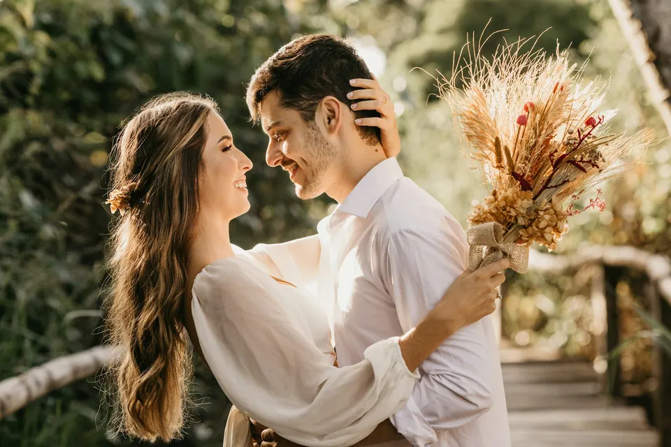 Couple laughing together outdoors