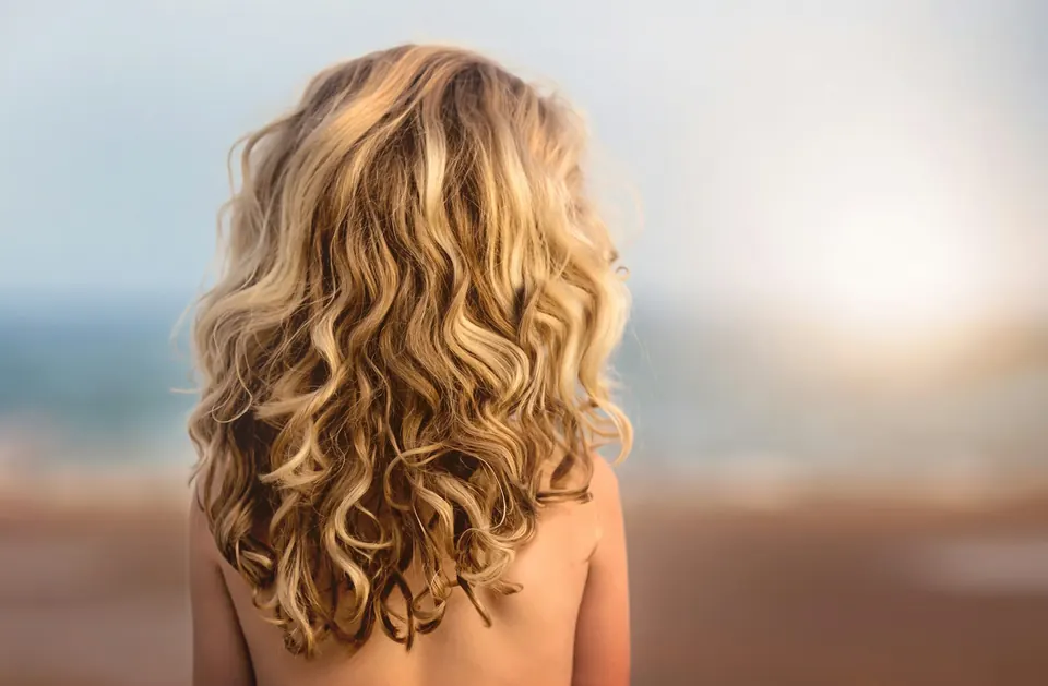 Golden curls in sunset light
